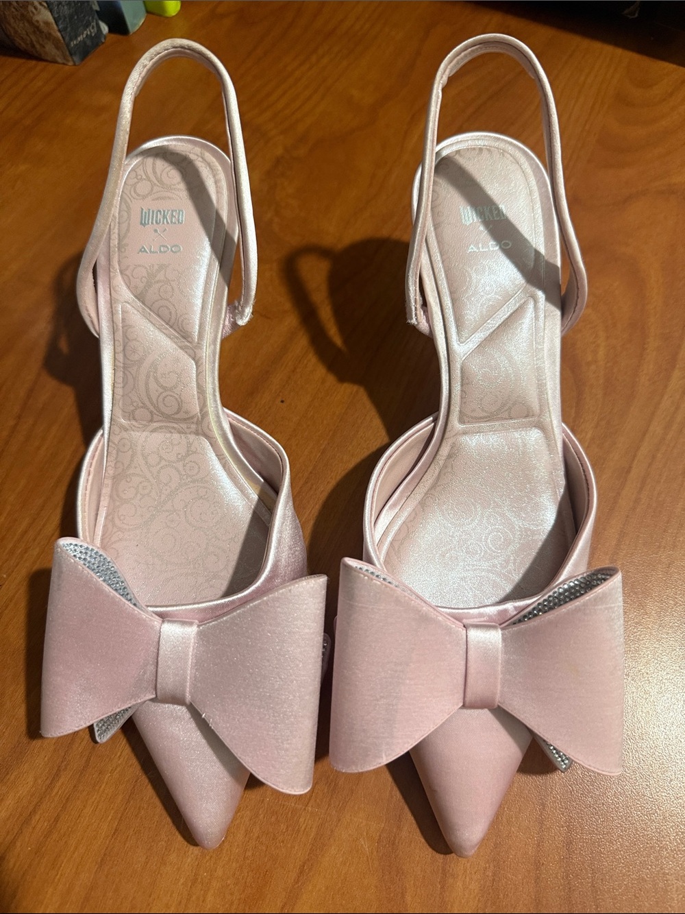 ALDO Wicked Glinda collab pink bow satin heels